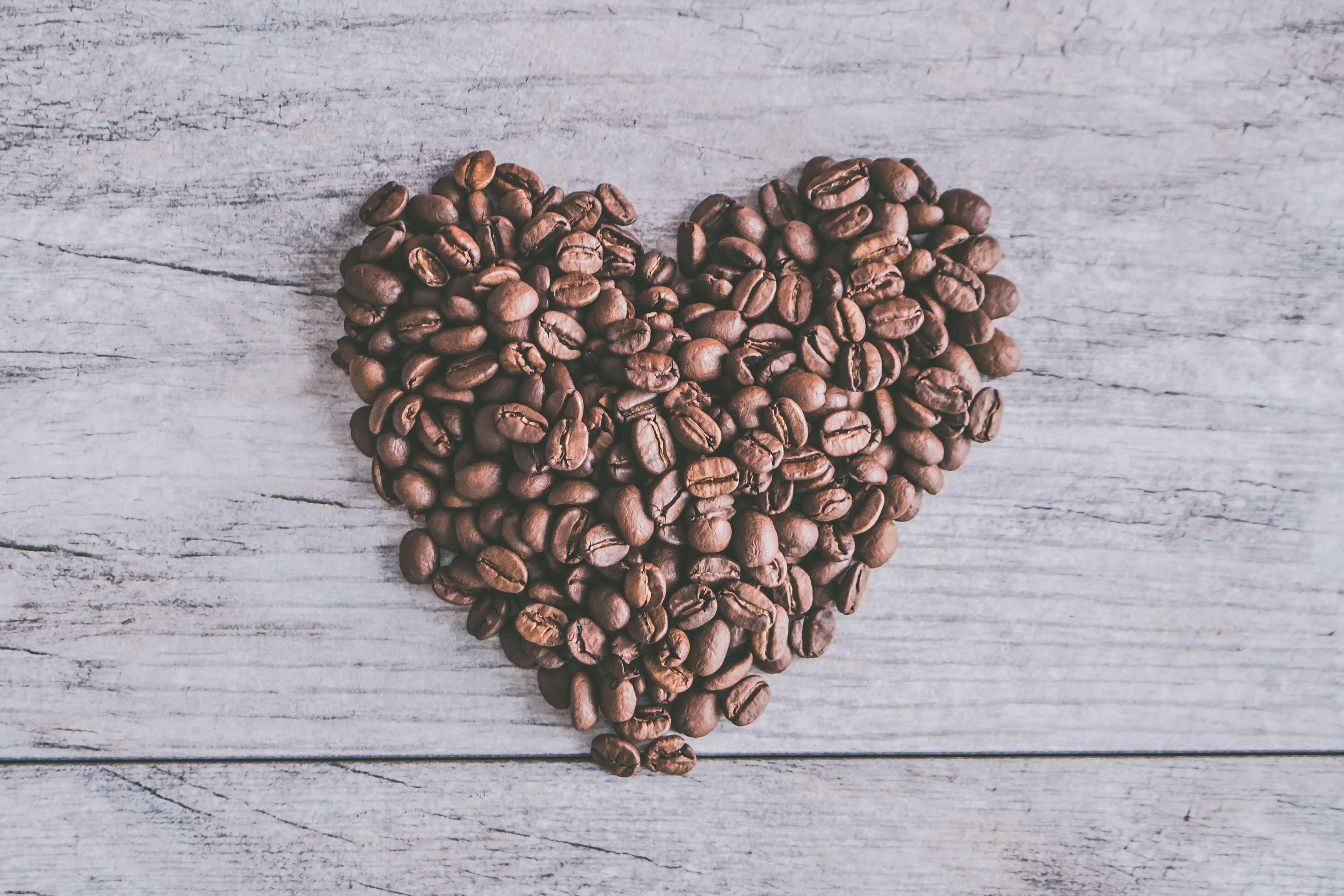 picture of coffee beans shaped into a heart