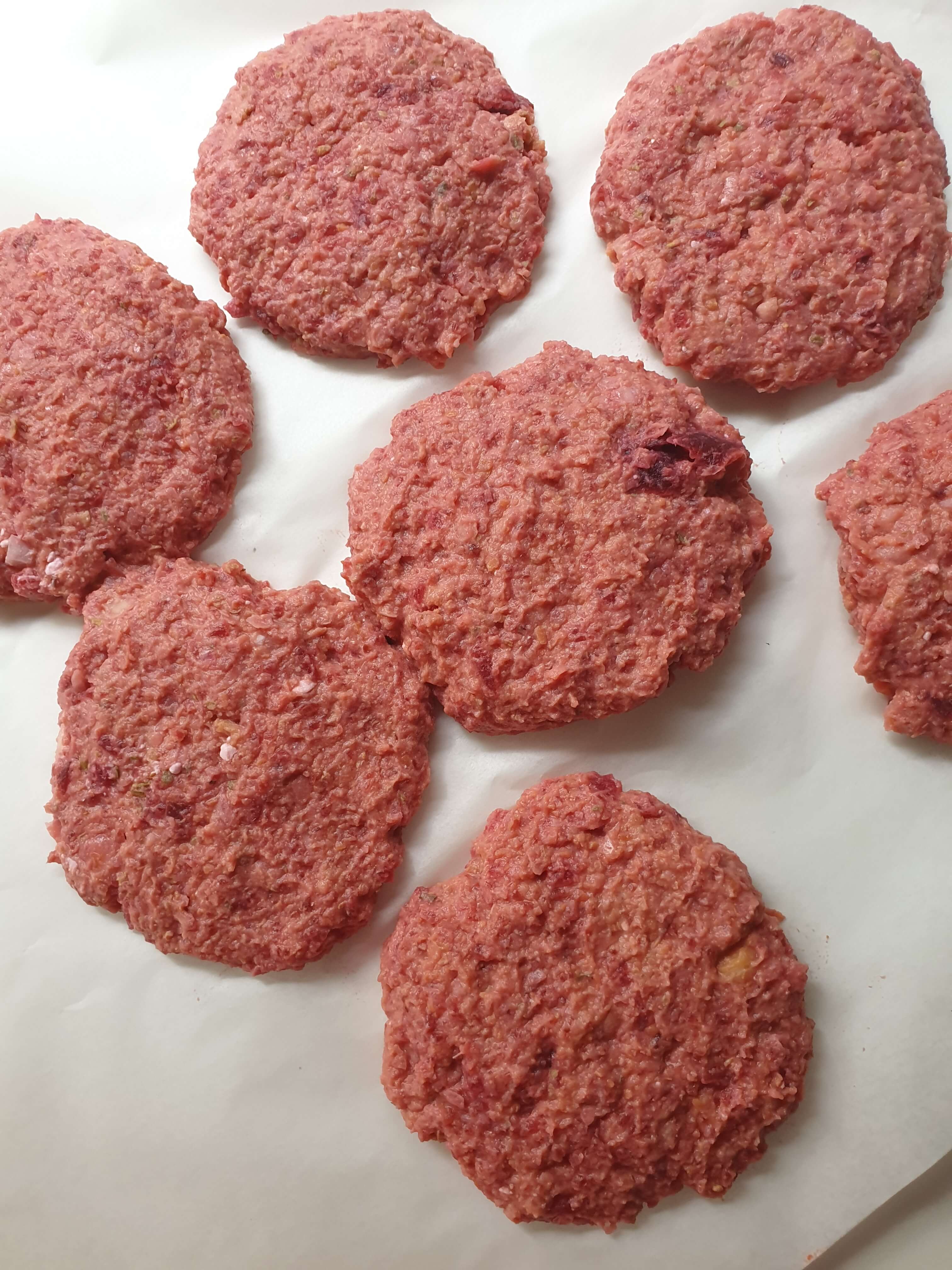 picture of raw Beetrot patties on a tray