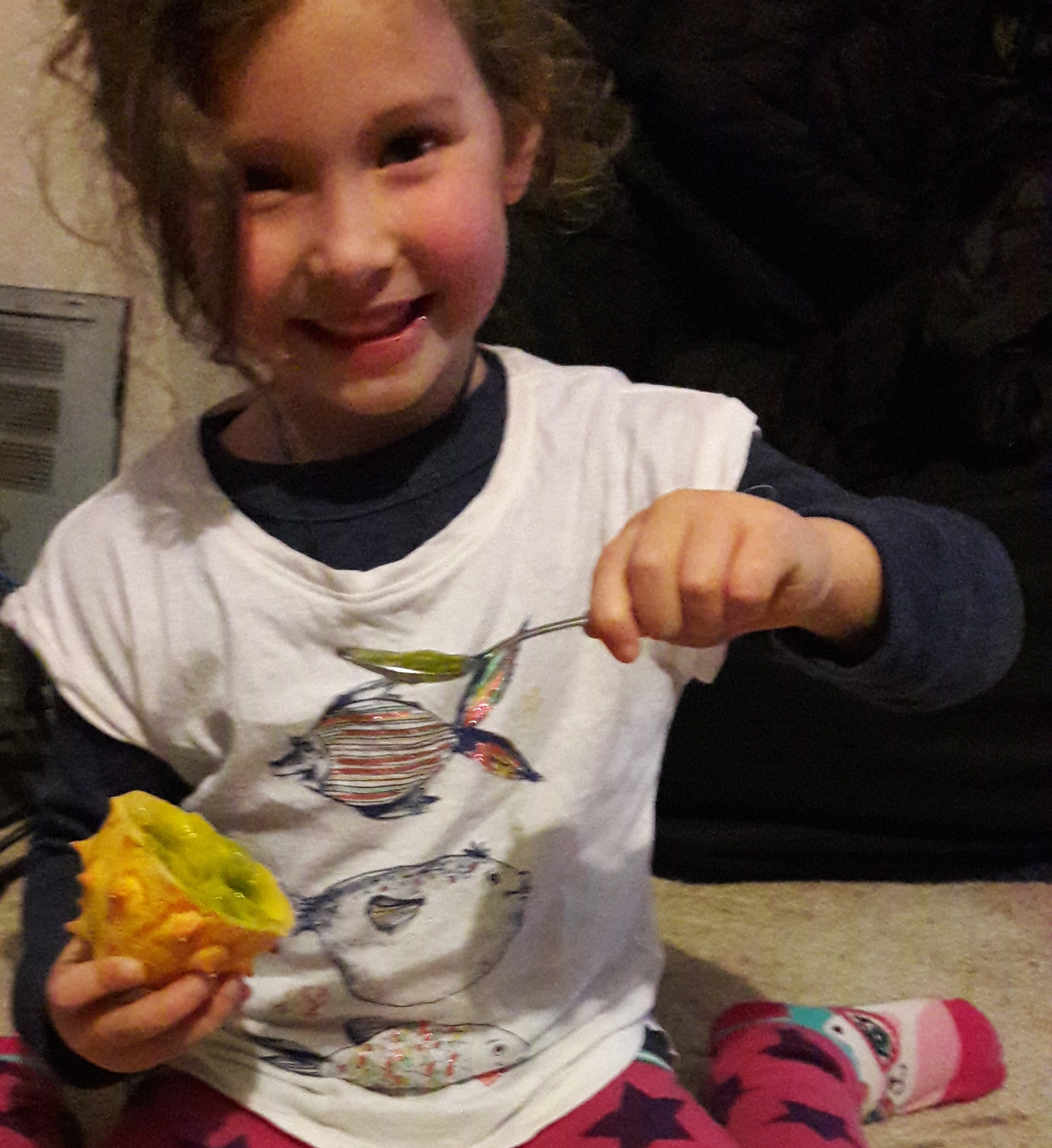 picture of girl eating kiwano
